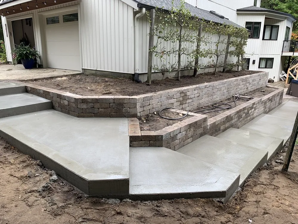 Expert lawn mowing service experts serving Holland, MI - TLC Concrete and Landscape