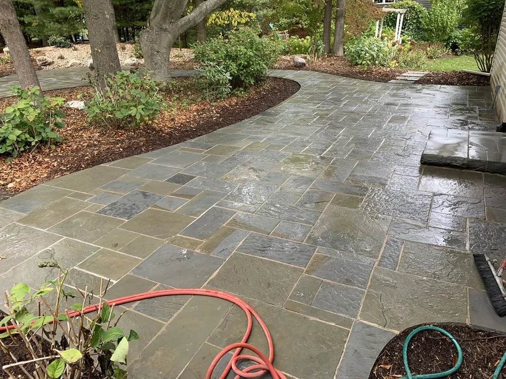 Affordable lawn mowing service in Holland, MI by TLC Concrete and Landscape