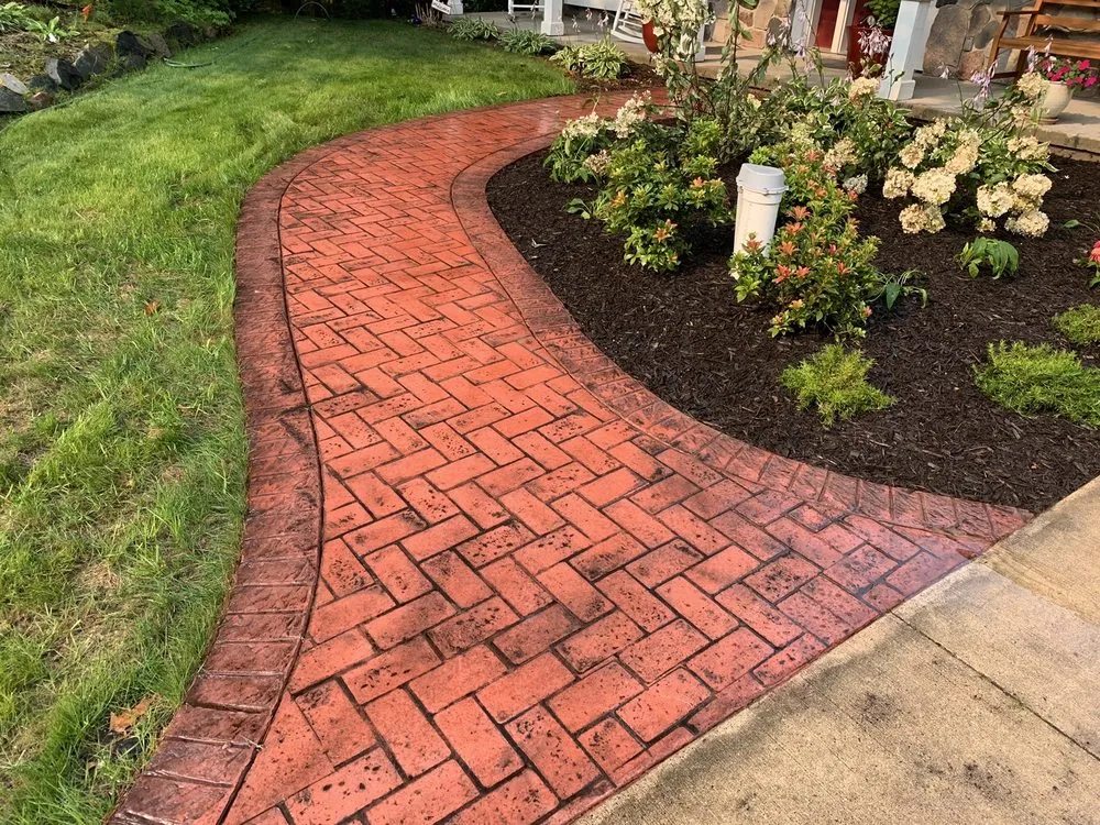 Top-rated lawn mowing service in Holland, MI by TLC Concrete and Landscape