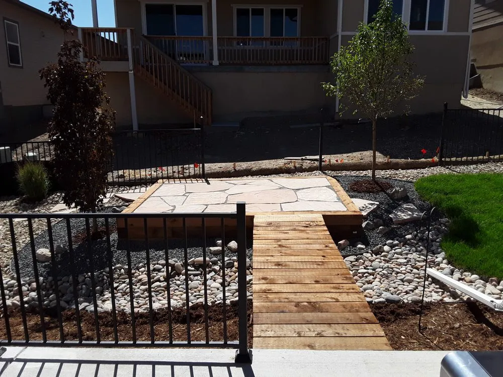 Professional lawn mowing service for homes in Arvada, CO by TLC Land Care