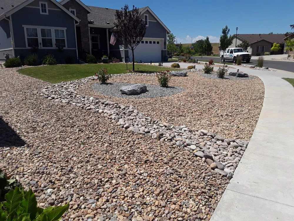 Custom yard cleanup service for year-round maintenance in Arvada, CO by TLC Land Care