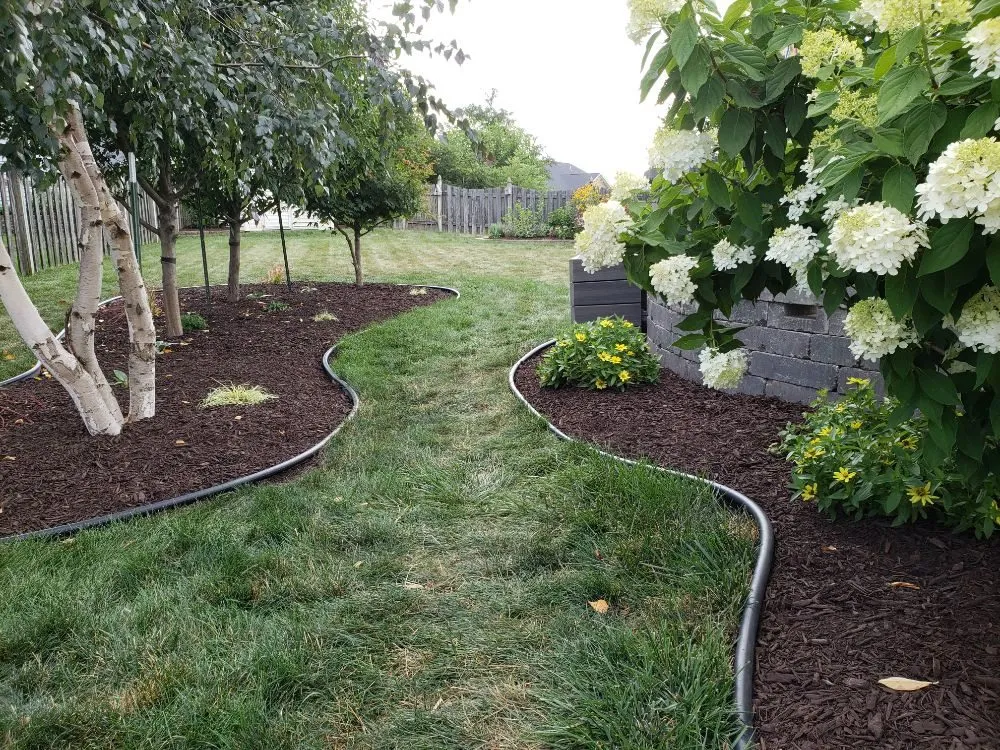 Local garden landscaping for homes across Muscatine, IA - TLC Maintenance
