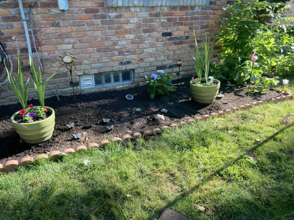 Affordable yard maintenance for homes in Detroit, MI by TLT Lawncare & Snow Removal