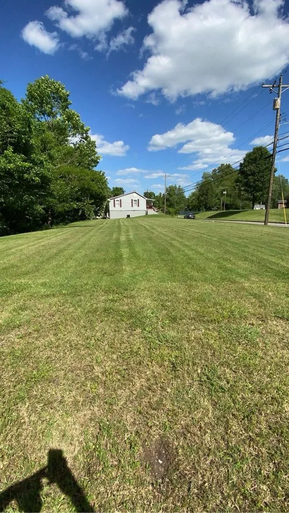 Reliable landscape installation for beautiful yards in Girdler, KY by T&M Bad Boy’s Lawn And Landscaping