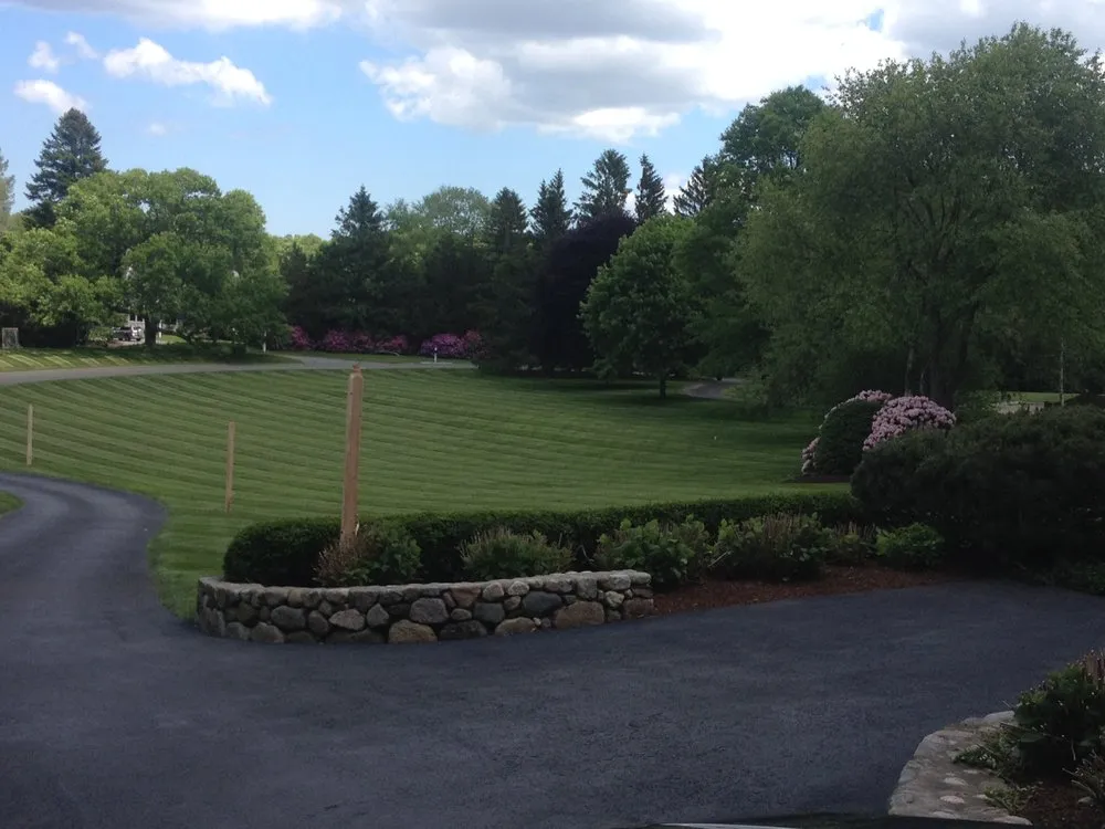 Local lawn care service for residential properties across South Hamilton, MA - TM Landscaping