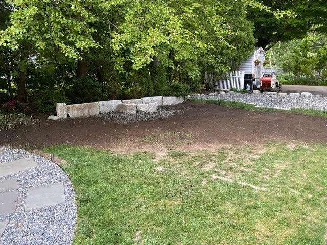 Custom landscape installation for outdoor upgrades in Dunstable, MA by TMC Lawn & Landscape