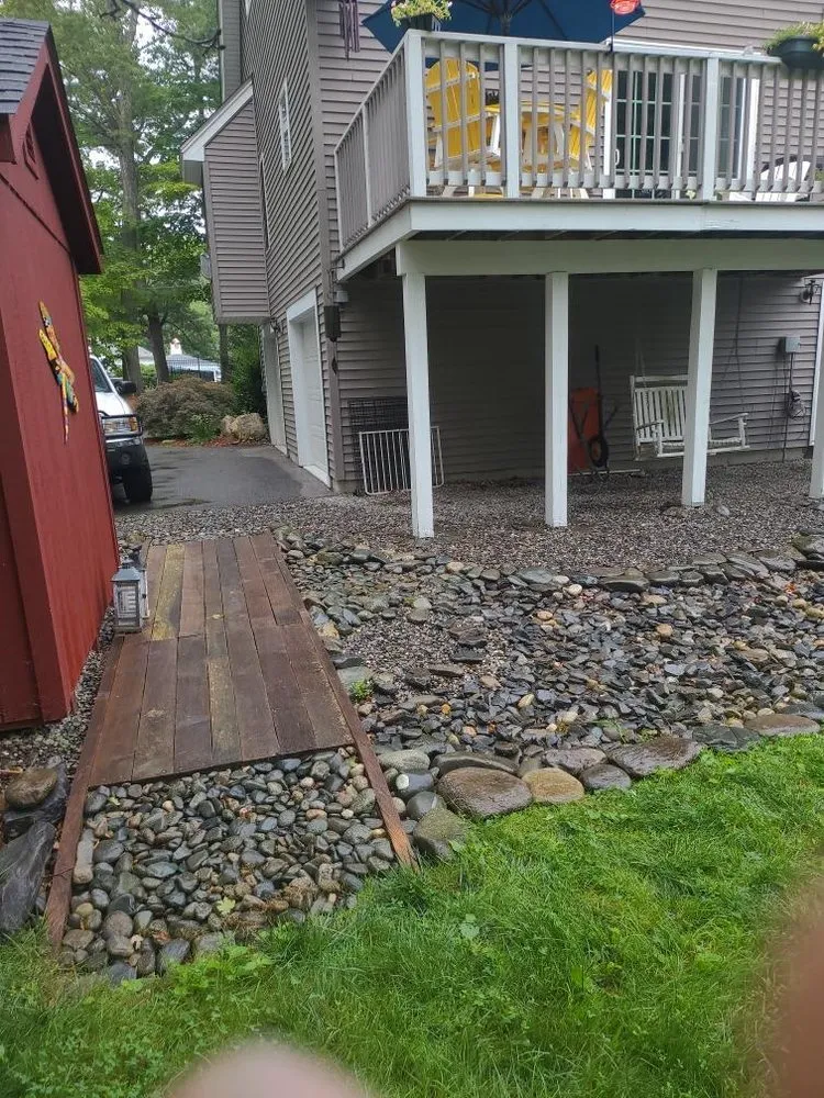 Local outdoor landscaping with custom design in Dunstable, MA by TMC Lawn & Landscape