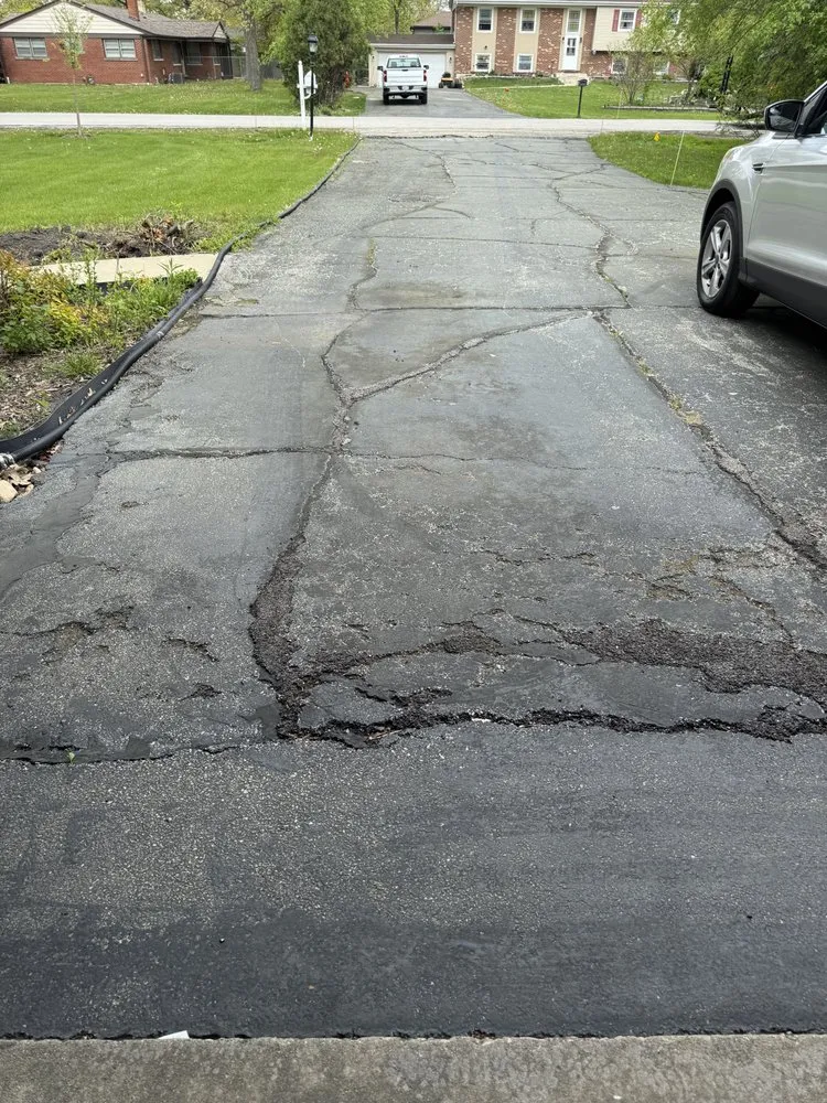 Custom yard cleanup service for year-round maintenance across Elk Grove Village, IL - TMW Enterprises Paving & Maintenance