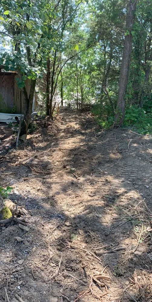 Trusted lawn mowing service for residential properties in Mt. Juliet, TN by TN Brush Busters & Excavation