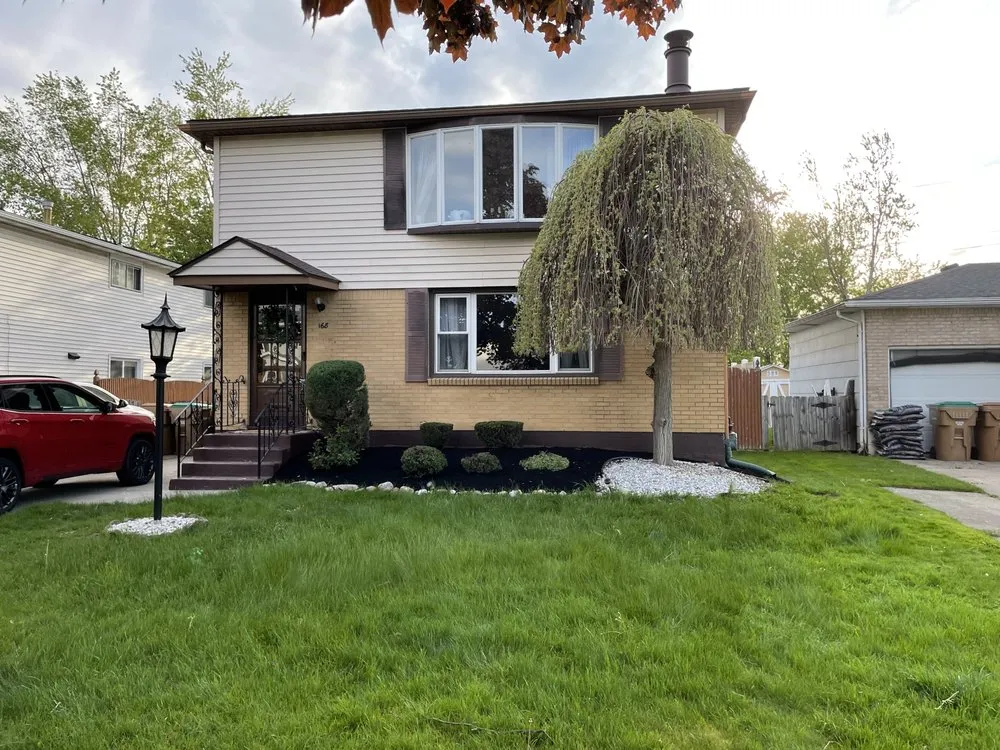 Professional yard maintenance for homes in Buffalo, NY by TNA Landscaping