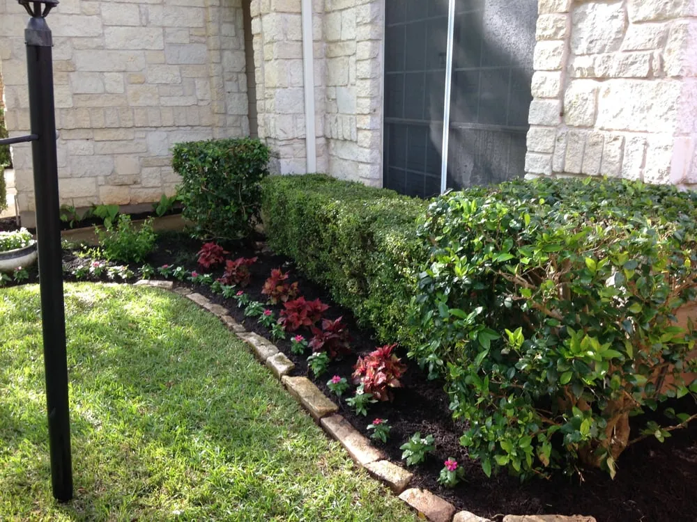 Reliable lawn mowing service for homes in Buda, TX by TNT Landscape Services