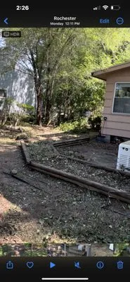 TNT Snow Removal & Lawn Care Experts Logo