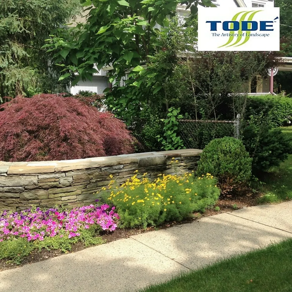 Custom landscape installation for year-round maintenance in Oakland, NJ by Todé Landscape Contractors