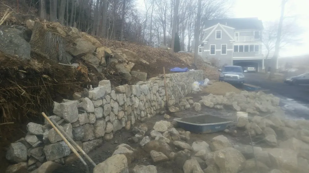 Expert landscape design for homes in Danbury, CT by Toledo Masonry