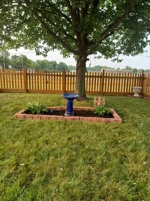 Tom N Erics Home N Lawncare Logo