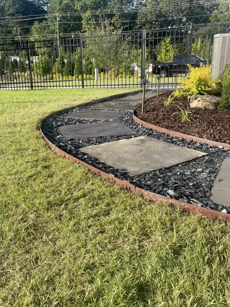 Custom lawn care service experts serving Woodstock, GA - Tomahawk Turf Landscape