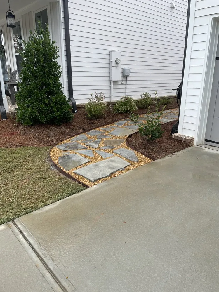 Professional yard maintenance near you in Woodstock, GA by Tomahawk Turf Landscape