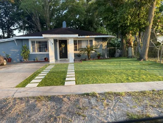 Tomas Ibarra Lawn Service Logo