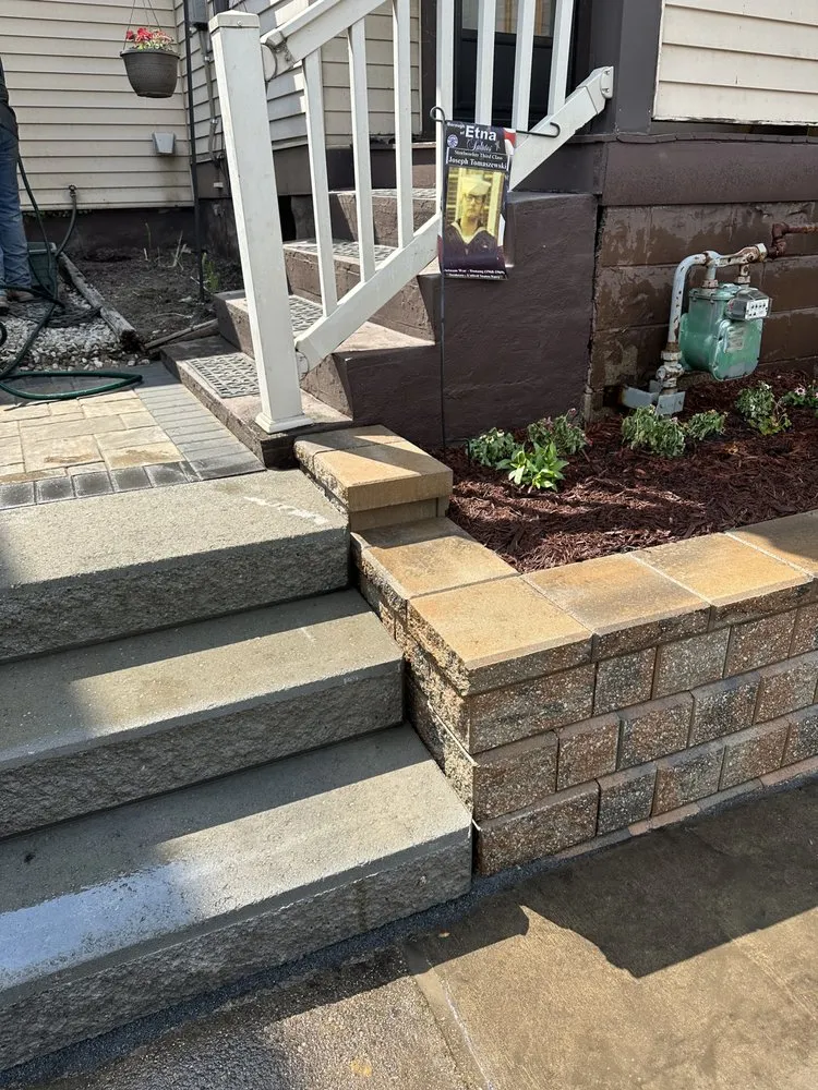 Trusted outdoor landscaping for residential properties in Butler, PA by Toma's Lawn And Landscape