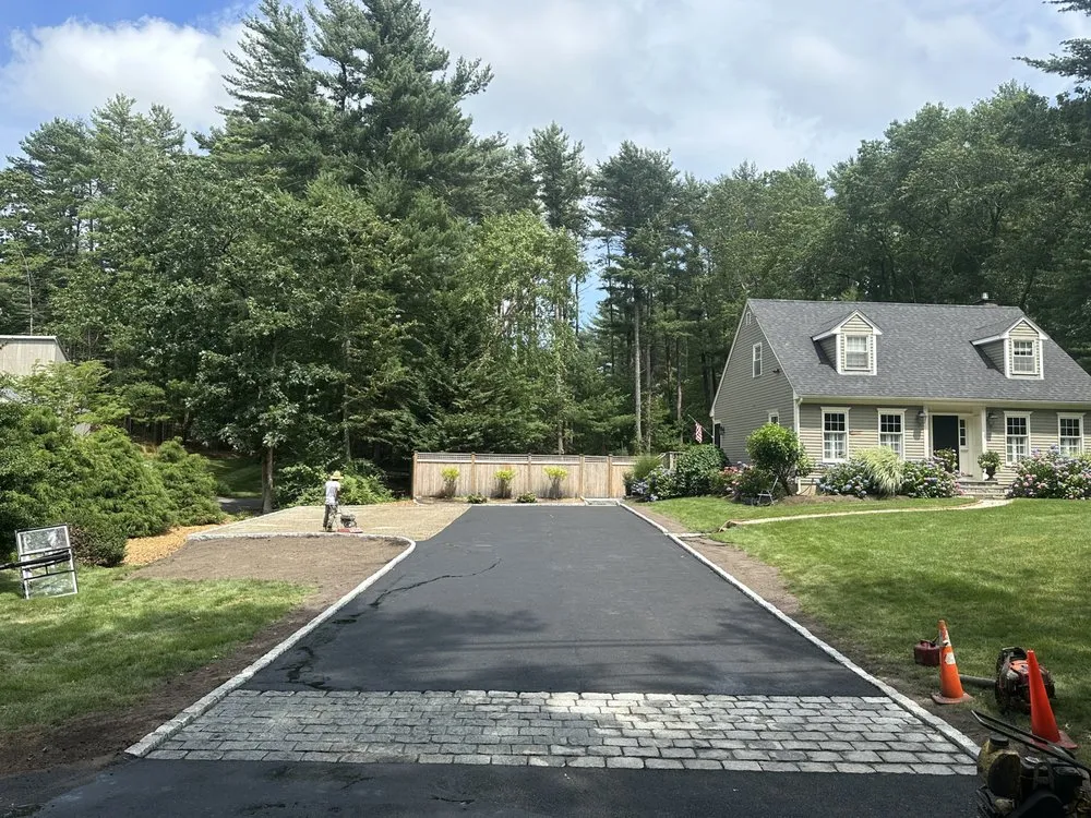 Affordable landscape installation in Rockland, MA by Tomaz Construction & Design