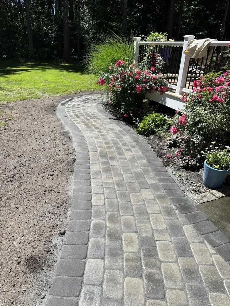 Trusted yard cleanup service for year-round maintenance in Rockland, MA by Tomaz Construction & Design