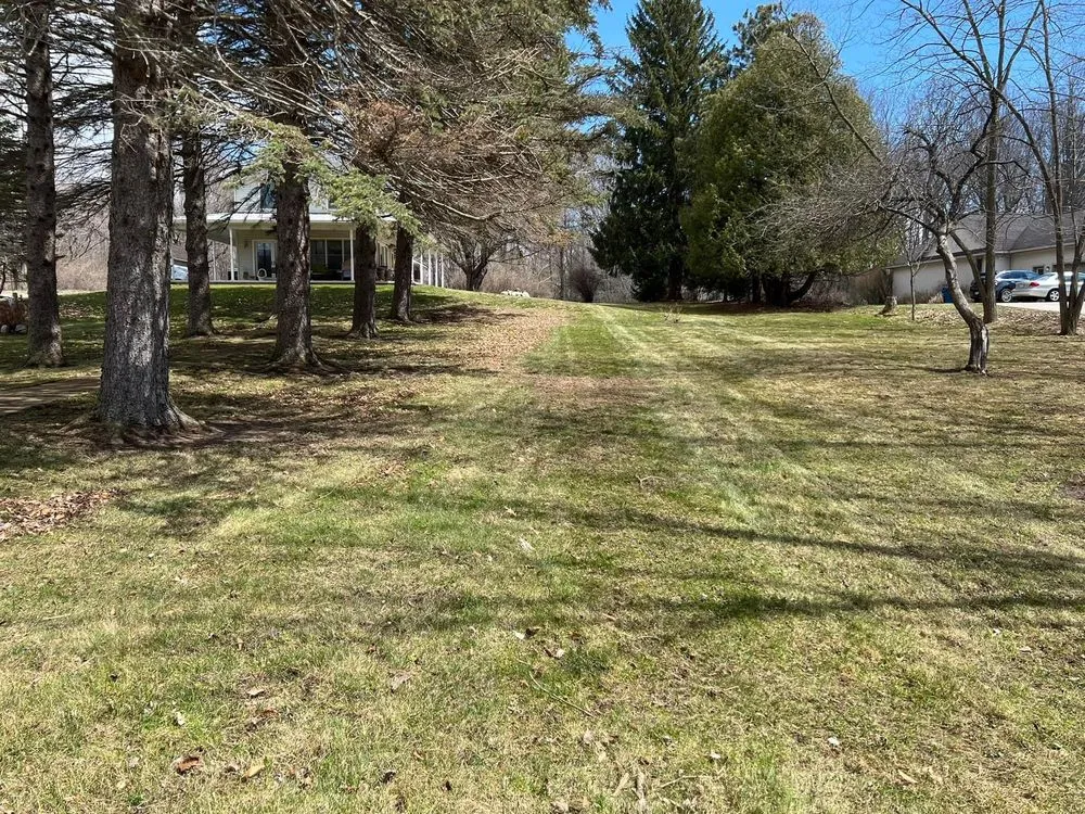 Affordable garden landscaping for year-round maintenance in Brethren, MI by Toms Lawn Care and Snow Removal