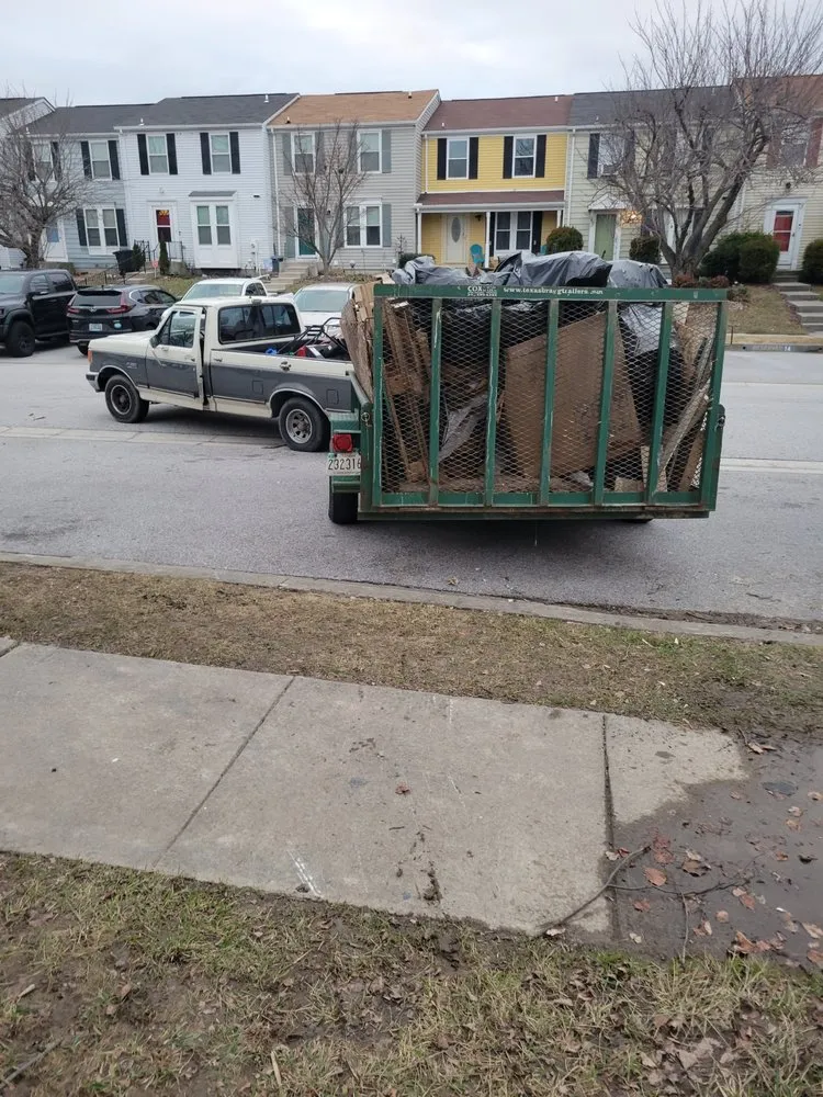 Affordable yard cleanup service for year-round maintenance in Odenton, MD by Tom's Lawn Service and Hauling