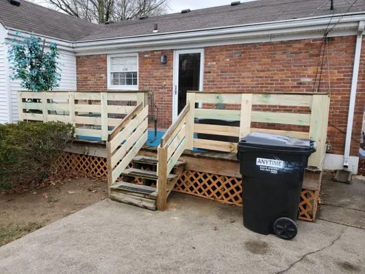 Tom's Total Landscaping Service Logo