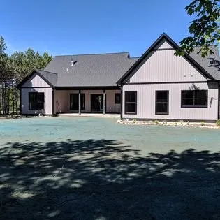 Trusted lawn care service experts serving Traverse City, MI - Toms Total Outdoor Maintenance Service