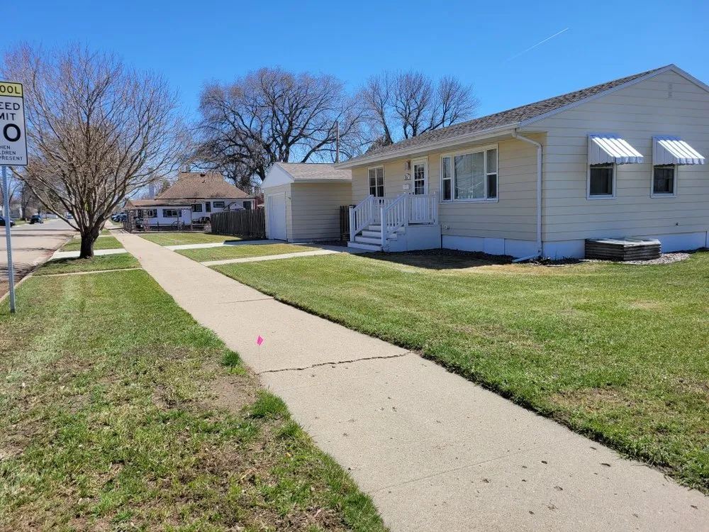 Affordable lawn mowing service with custom design in Minot, ND by Tony's Lawn Service