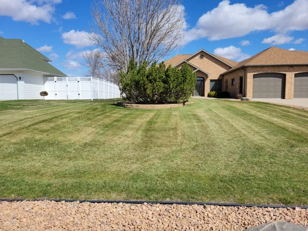 Reliable lawn care service for year-round maintenance across Minot, ND - Tony's Lawn Service