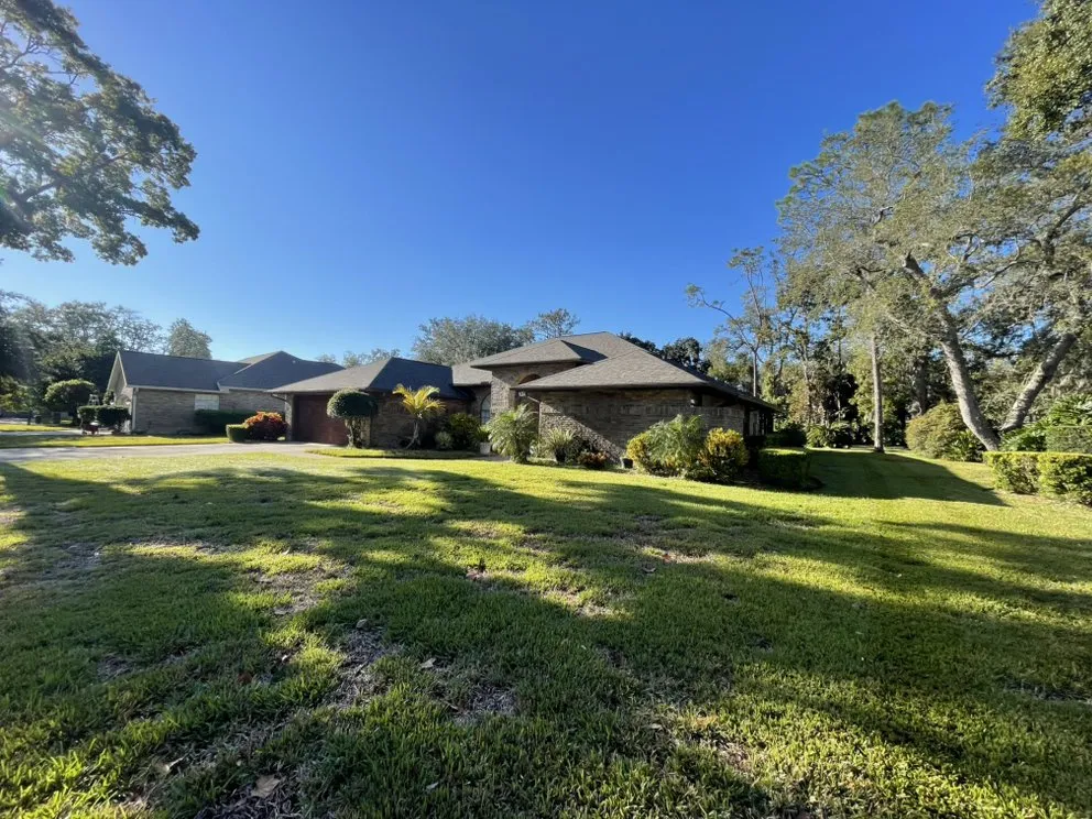 Affordable yard cleanup service with custom design across Daytona Beach, FL - Tony's Turf