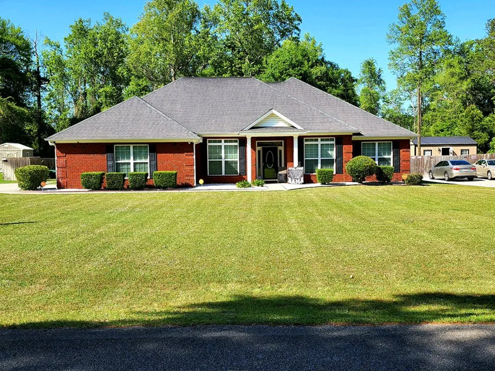 Custom yard cleanup service for residential properties in Allenhurst, GA by TooEasy Cuts