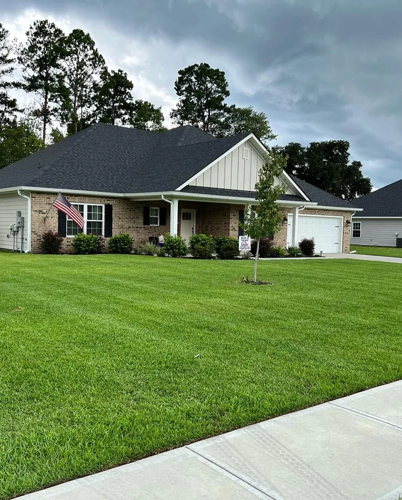 Trusted lawn mowing service for year-round maintenance in Allenhurst, GA by TooEasy Cuts