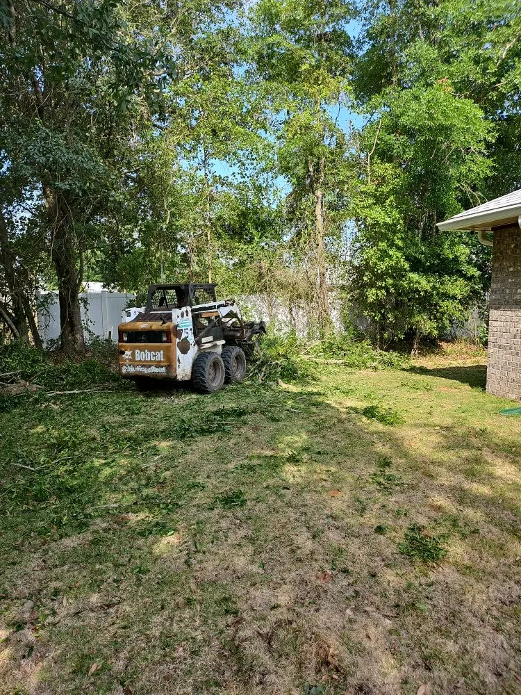 Professional lawn mowing service in Pensacola, FL by Top 2 Bottom Land Services