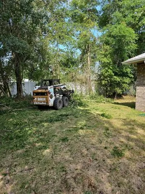 Top 2 Bottom Land Services Logo