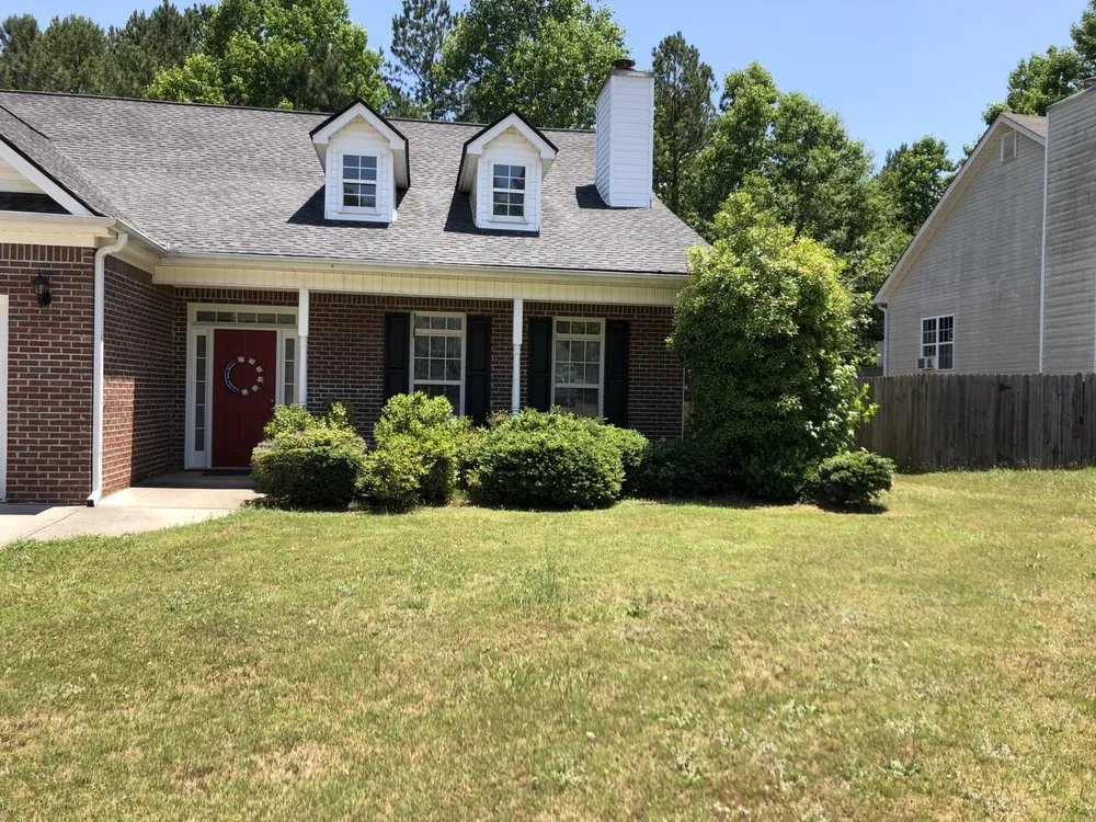 Custom landscape design in Temple, GA by Top Cut Properties