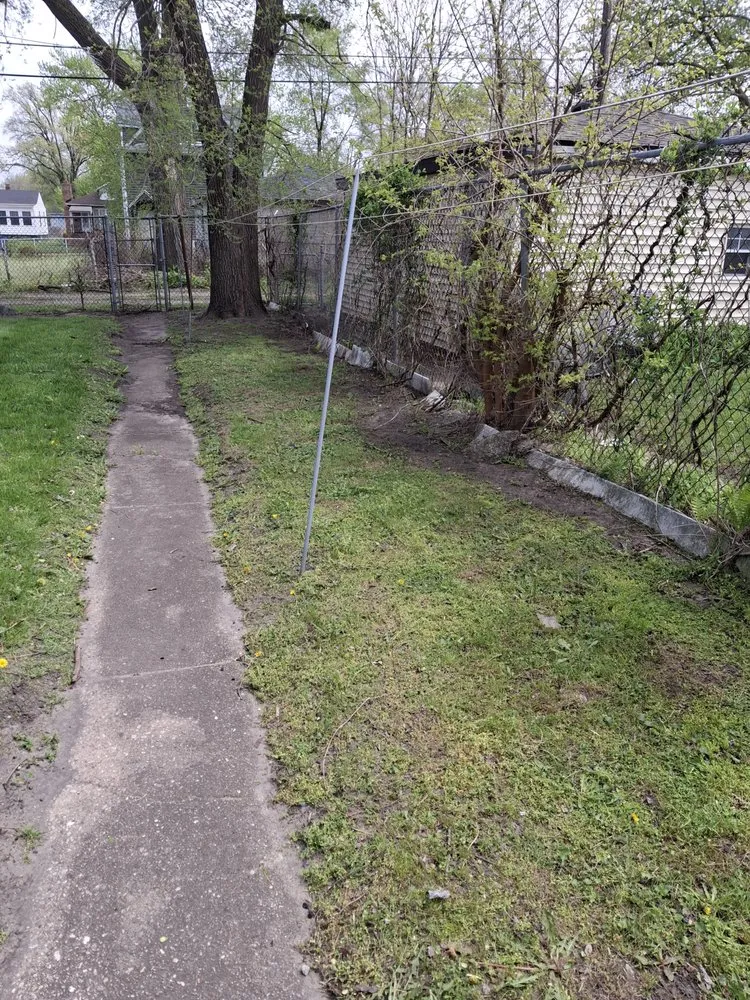 Affordable lawn mowing service for residential properties in Gary, IN by Top Cuts Landscaping