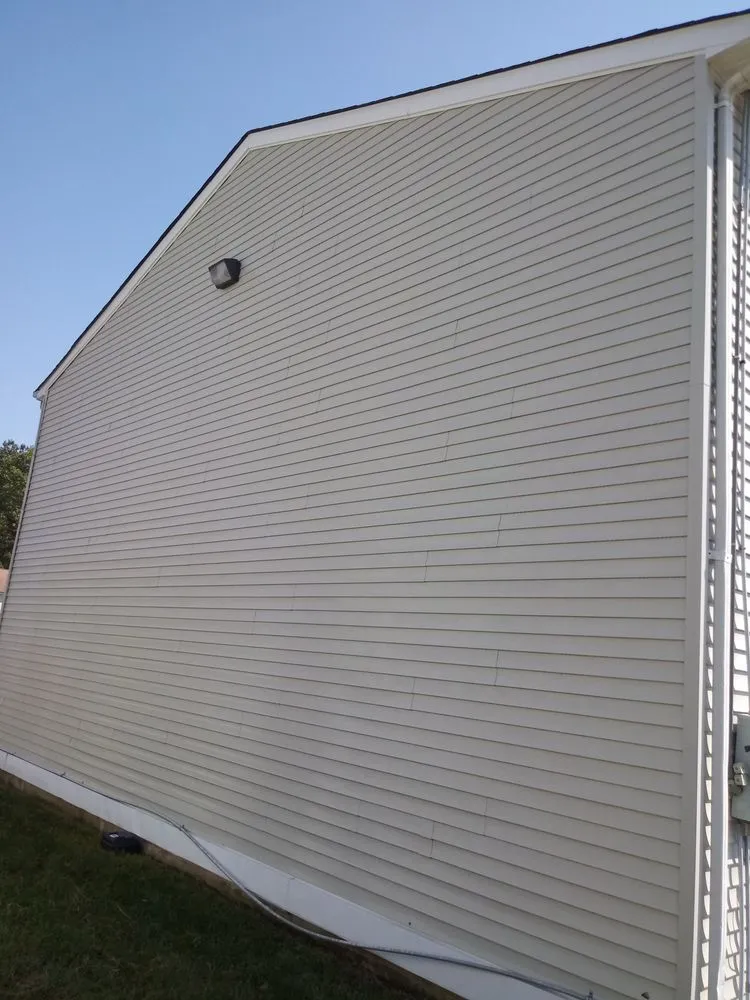 Affordable lawn mowing service for outdoor upgrades in Toano, VA by Top Dawg Exterior