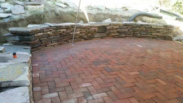 Custom yard cleanup service for outdoor upgrades in St. George, VT by Top Dog Landscaping