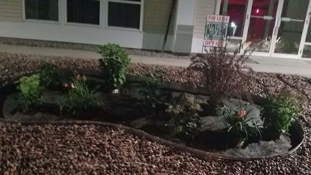 Affordable landscape installation with custom design in St. George, VT by Top Dog Landscaping