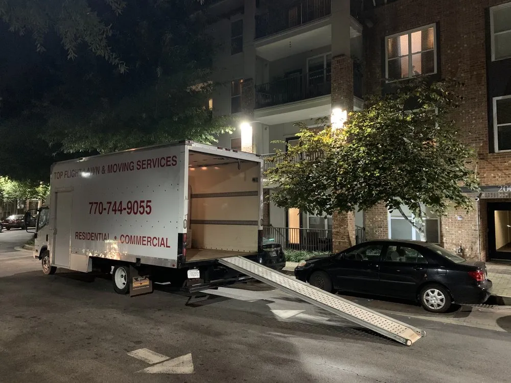 Custom lawn mowing service for outdoor upgrades in Union City, GA by Top Flight Lawn & Moving Services