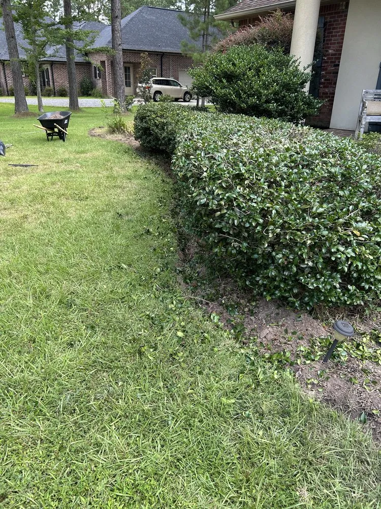 Professional lawn mowing service for homes across Madisonville, LA - Top Green Maintenance