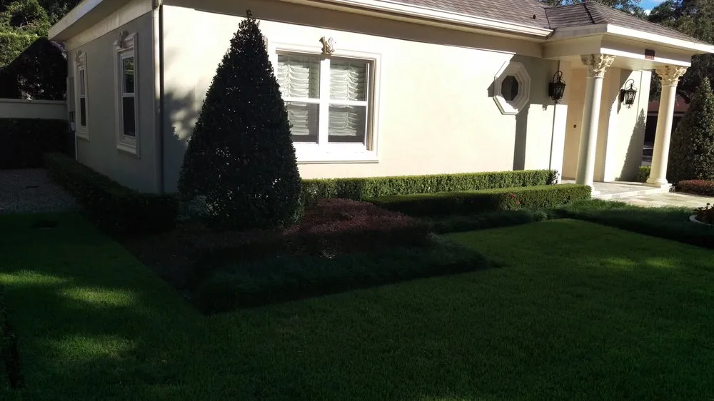 Top-rated lawn mowing service for residential properties across Windermere, FL - Top Gunn Lawn Care