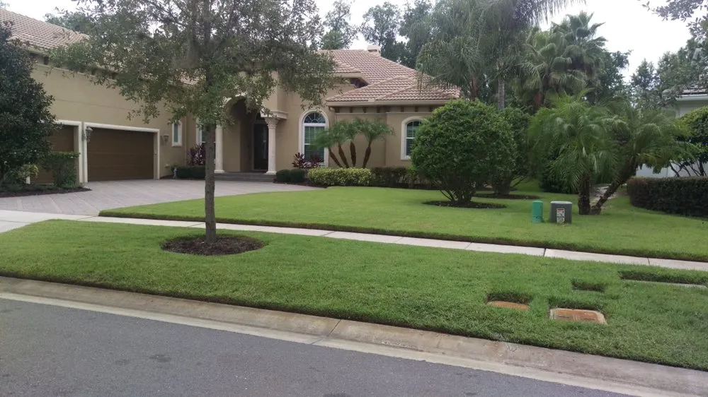 Reliable outdoor landscaping for residential properties in Windermere, FL by Top Gunn Lawn Care