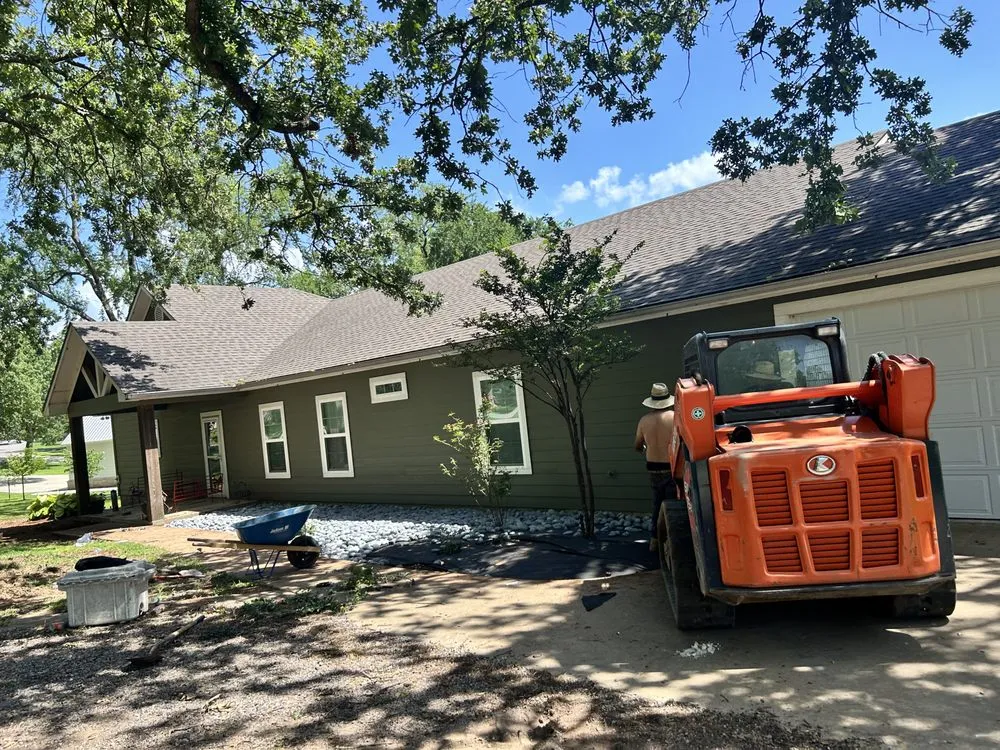 Custom landscape installation in Tishomingo, OK by Top Lawn Care and Landscape