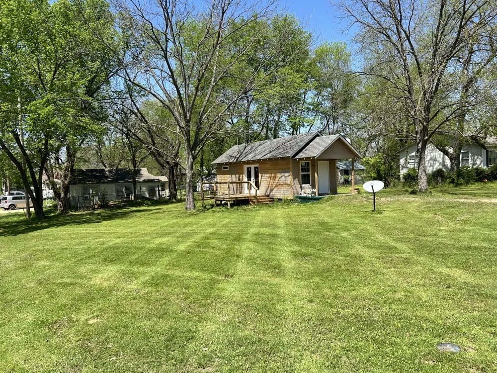 Professional lawn mowing service for year-round maintenance in Tishomingo, OK by Top Lawn Care and Landscape