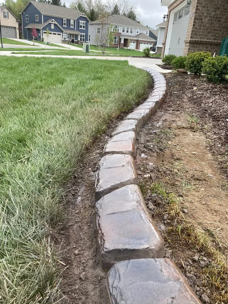 Expert yard cleanup service for beautiful yards across Pittsboro, IN - Top Notch Custom Concrete