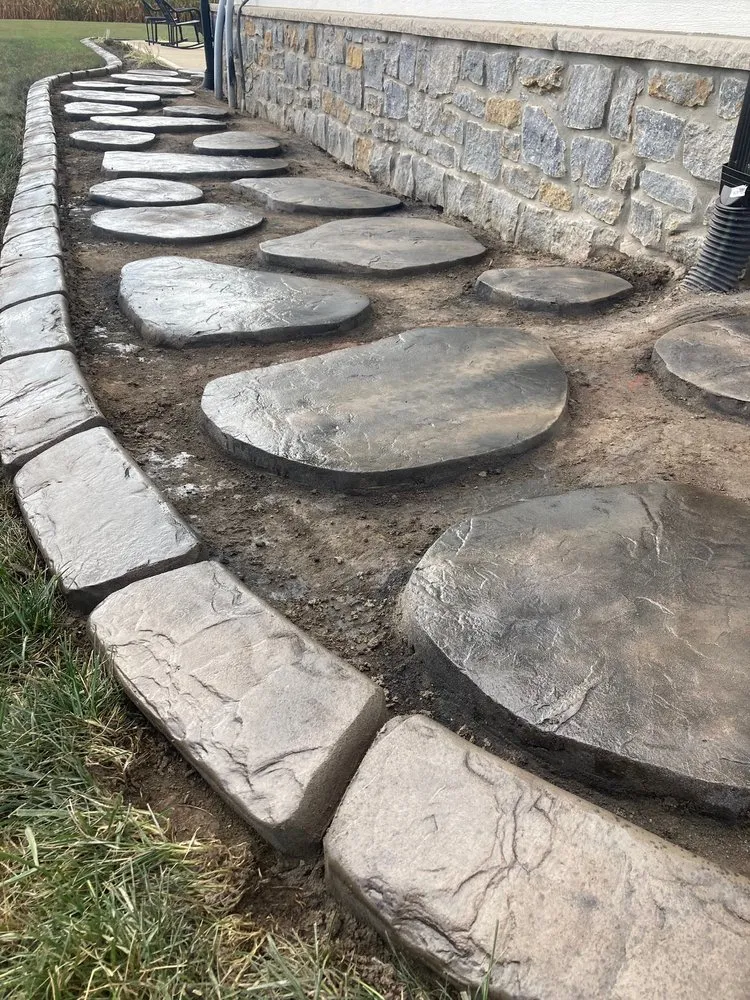 Professional lawn care service for year-round maintenance across Pittsboro, IN - Top Notch Custom Concrete