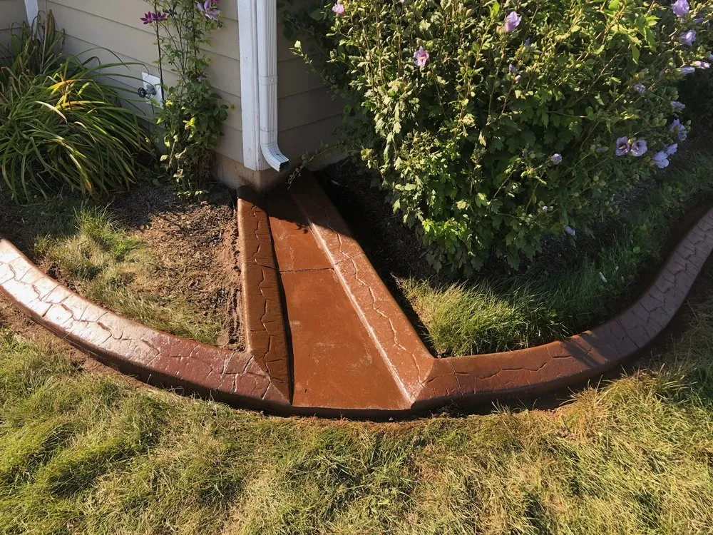 Local landscape design in Pittsboro, IN by Top Notch Custom Concrete